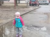 Прорезиненный комбинезон в дождь.